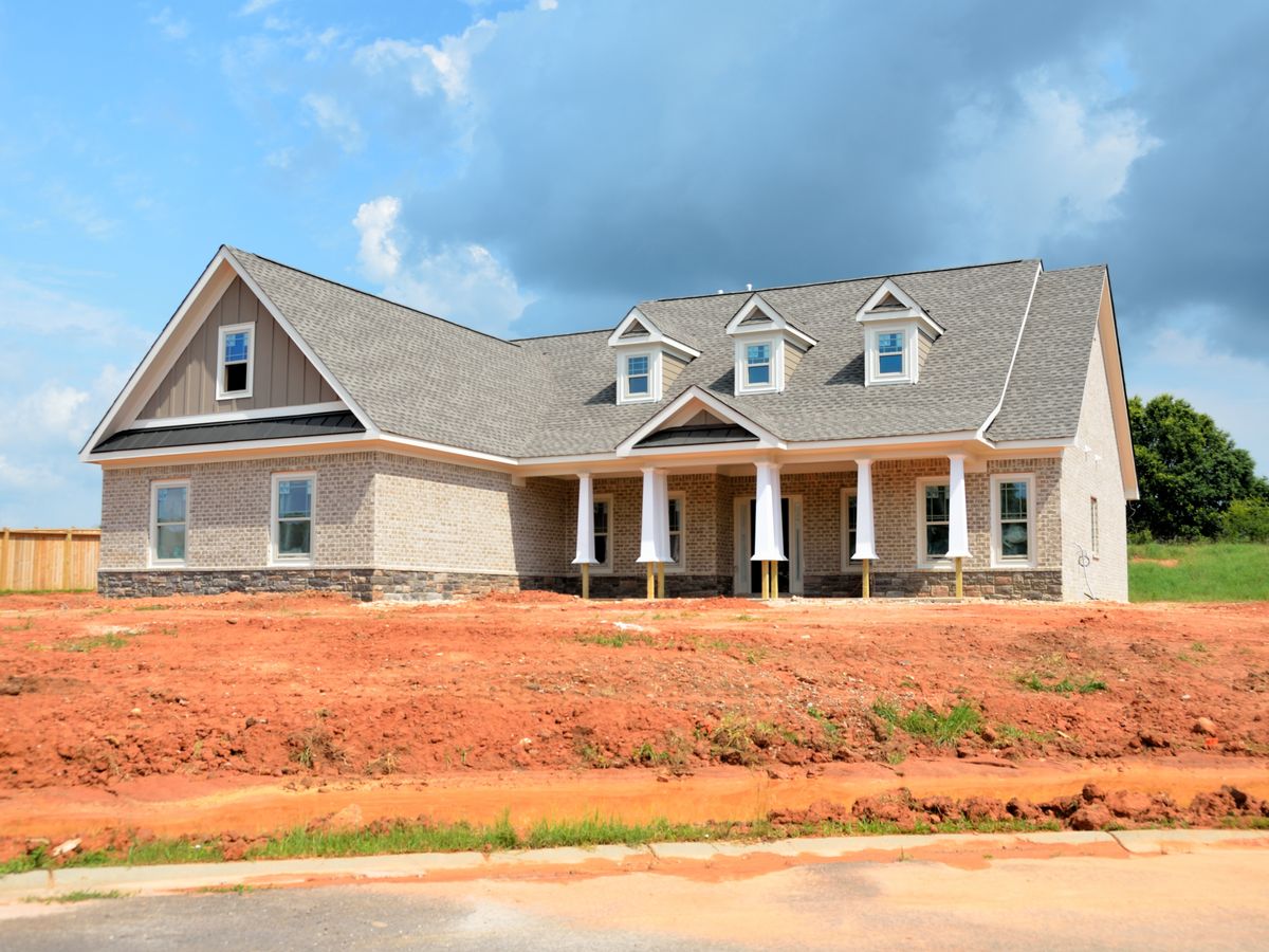 Suburban home with newly installed architectural shingle roof